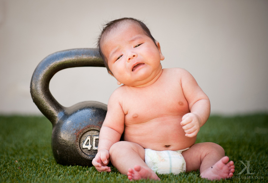 Baby with kettlebell