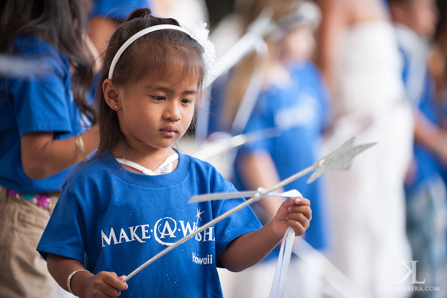 Make A Wish girl holding star at Kahala Resort, Hawaii